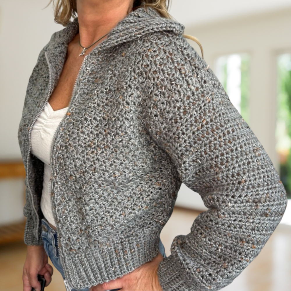 a woman wearing a handmade crochet cardigan