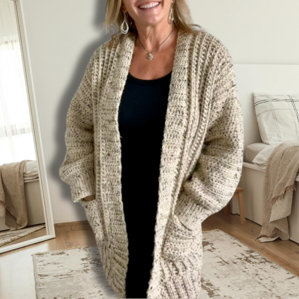 a woman wearing a crochet cardigan