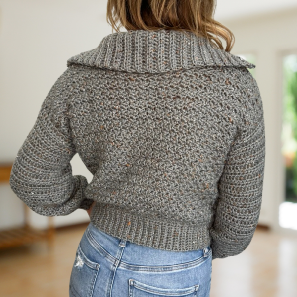 a woman wearing a handmade crochet cardigan