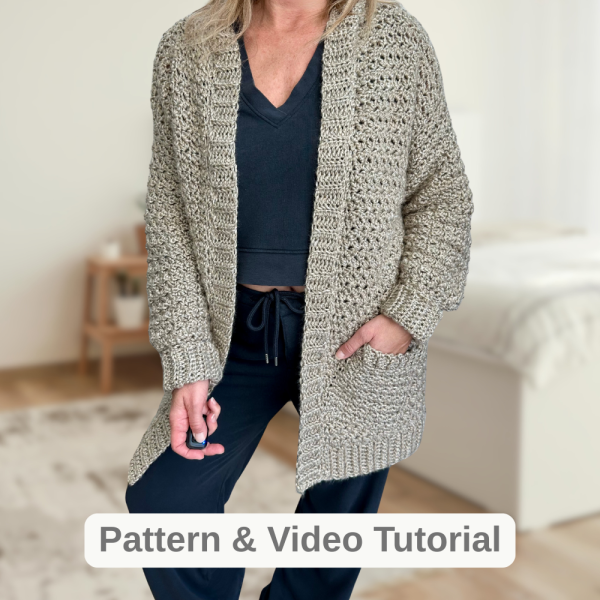 a woman wearing a handmade crochet cardigan